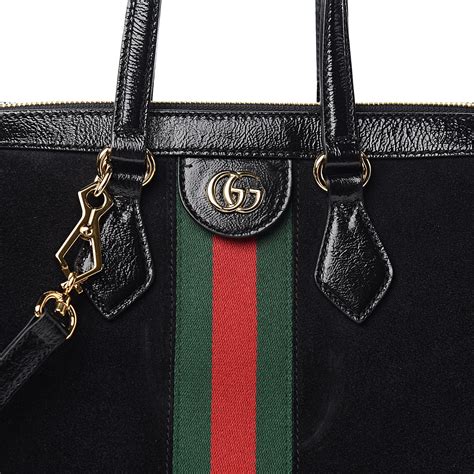 gucci black canvas bag.